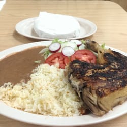 Gloria's Pupuseria - Pollo Asado con arroz y frijoles con tortillas echo a mano. Grilled chicken with rice and beans and hand palmed tortillas.