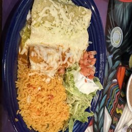 Beef, cheese and chicken enchiladas platter. Beef, cheese and chicken enchiladas platter.