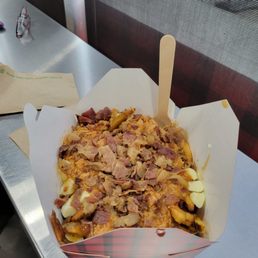 Large, double pork poutine--good portion for 2 people, but do not recommend getting the pork Large, double pork poutine--good portion for 2 people, but do not recommend getting the pork