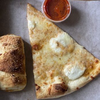 Arte Pizzeria - Bianca pizza and pepperoni calzone - Pizza Near Me - Loveland, Colorado Arte Pizzeria - Bianca pizza and pepperoni calzone - Pizza Near Me - Loveland, Colorado