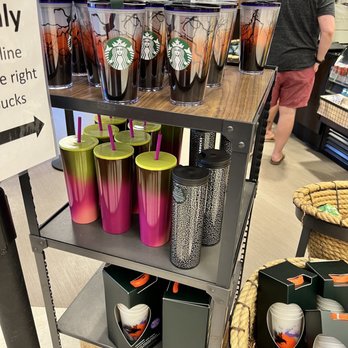 Starbucks - a display of various cups and mugs - Coffee & Tea Near Me - Destin, Florida
