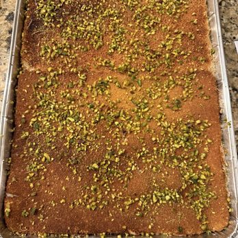 Zmzm Sweets - This is suppose to be a half/half knafeh tray. It's clearly not. Top left corner is burnt - Middle Eastern Near Me - Chicago Ridge, Illinois Zmzm Sweets - This is suppose to be a half/half knafeh tray. It's clearly not. Top left corner is burnt - Middle Eastern Near Me - Chicago Ridge, Illinois