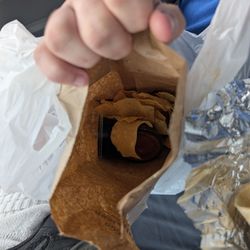 Diego's Burrito Factory - Nondescript tortilla chips in a paper bag.