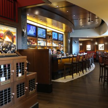 The Capital Grille - View of a classy bar. - Steakhouses Near Me - Skokie, Illinois