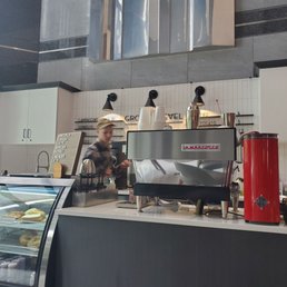 a man working in a coffee shop