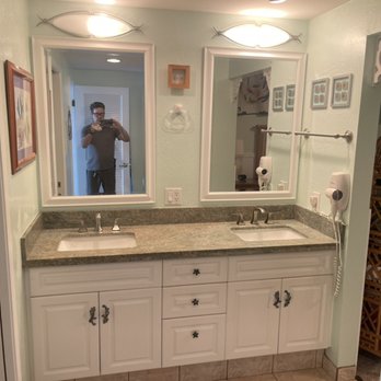 Mdl Building - a man taking a picture of himself in the mirror - General Contractors Near Me - Lahaina, Hawaii