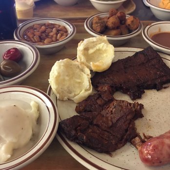 Underwood's Cafeteria - Beef steak, sausage, potatoes and gravy, beans, fried okra, bbq sauce, and cherry peppers. All totally delicious - Barbeque Near Me - Brownwood, Texas