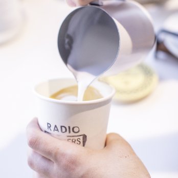 Radio Roasters Coffee - Pouring milk for a cap to remember - Coffee Roasteries Near Me - Decatur, Georgia Radio Roasters Coffee - Pouring milk for a cap to remember - Coffee Roasteries Near Me - Decatur, Georgia