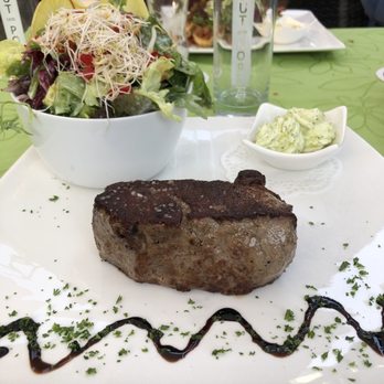Gut Porz - Argentine beef steak cooked to perfection. Medium rare along with a delicious salad and some herbed butter - German Near Me - Ratingen, NW