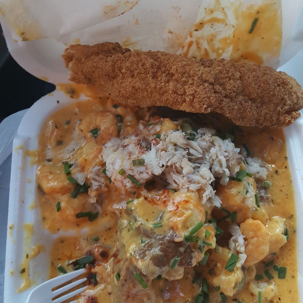 Hank's Bar - Seafood Potato$10-$13  with fried fish $3 - Bars Near Me - New Orleans, Louisiana