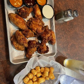 Archer's Tavern Kettering - Wing flight, sexy style, gochujang, and wing& a prayer sauce. - Bars Near Me - Dayton, Ohio Archer's Tavern Kettering - Wing flight, sexy style, gochujang, and wing& a prayer sauce. - Bars Near Me - Dayton, Ohio