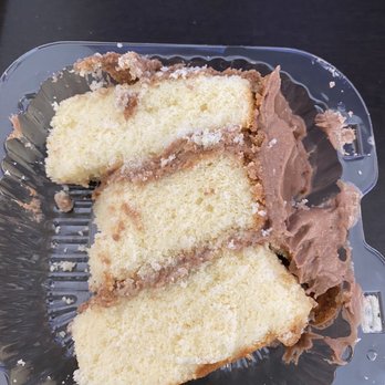 Le Chateau - Moist Golden Chocolate Cake Slice... Minus 2 bites! Delicious - Bakeries Near Me - Winston Salem, North Carolina Le Chateau - Moist Golden Chocolate Cake Slice... Minus 2 bites! Delicious - Bakeries Near Me - Winston Salem, North Carolina