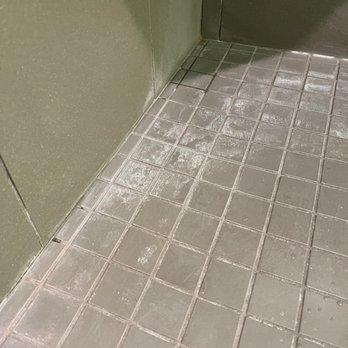 Neat Cleaning Services - Adjacent section of shower after they "cleaned" it. - Home Cleaning Near Me Neat Cleaning Services - Adjacent section of shower after they "cleaned" it. - Home Cleaning Near Me