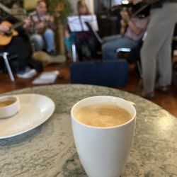 Coffee & Moore - Organic coffee, and empty pretzel plate, and good music on a rainy day :)
