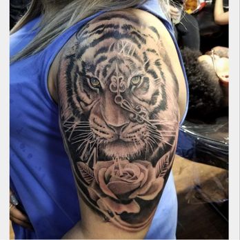 Untouchable Inks - Black and grey tiger done by artist @inkandpa1nt - Tattoo Near Me - Brooklyn, New York