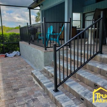True Aluminum - the steps leading up to the pool - General Contractors Near Me - Plant City, Florida True Aluminum - the steps leading up to the pool - General Contractors Near Me - Plant City, Florida