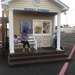 Snowball Express - Order at window or drive-thru Seating on the left-picnic tables