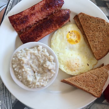 Old Dixie Cafe North - Smoked sausage breakfast with wheat toast and oatmeal - Breakfast & Brunch Near Me - Hobe Sound, Florida
