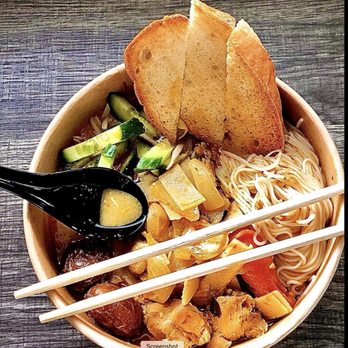Lady Apsara - a bowl of food with chopsticks - Asian Fusion Near Me - Warsaw, Indiana