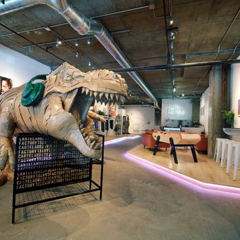 Le Cartel - a t - rex in a museum setting - Men's Clothing Near Me - Montreal, Quebec