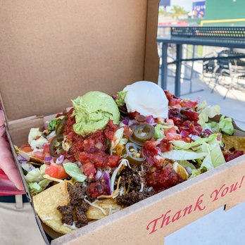 Superior Pools Tomahawk Tiki Bar & Grill - Kitchen Sink Nachos - Tiki Bars Near Me - Venice, Florida Superior Pools Tomahawk Tiki Bar & Grill - Kitchen Sink Nachos - Tiki Bars Near Me - Venice, Florida