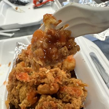 The Fish House Eatery - Fried oyster w a little hot sauce - Seafood Near Me - Apex, North Carolina