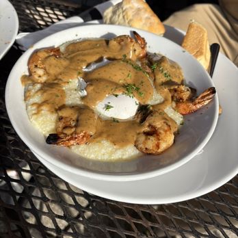 Russell's Marina Grill - Shrimp and grits with a biscuit - Breakfast & Brunch Near Me - New Orleans, Louisiana Russell's Marina Grill - Shrimp and grits with a biscuit - Breakfast & Brunch Near Me - New Orleans, Louisiana