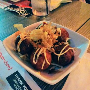 Bonchon - Takoyaki - Fried octopus dumplings with Katsu sauce and bonito flakes - Chicken Wings Near Me - Orlando, Florida Bonchon - Takoyaki - Fried octopus dumplings with Katsu sauce and bonito flakes - Chicken Wings Near Me - Orlando, Florida