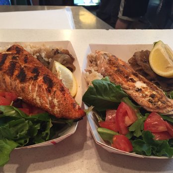 Market Grill - Salmon platter on the left Halibut platter on the right - Seafood Near Me - Seattle, Washington Market Grill - Salmon platter on the left Halibut platter on the right - Seafood Near Me - Seattle, Washington