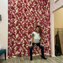 Diamonds & Pearls Bridal - Floral backdrop with my friend being dumb