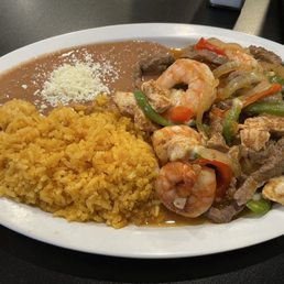 Steak, Shrimp, and Chicken Fajita (wraps not shown)