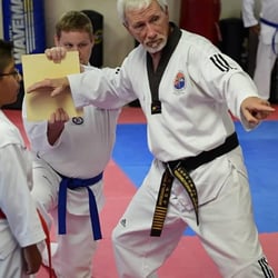 Anderson School of Tae Kwon DO - Grand Master Anderson instructing a student during a belt test.