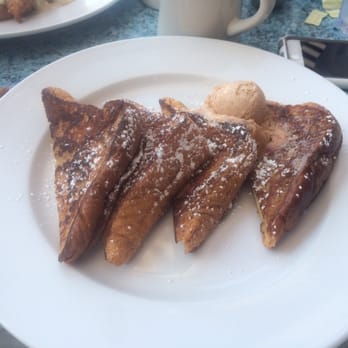 Iron Rooster - Challah bread French toast topped with maple bourbon butter - Cocktail Bars Near Me - Annapolis, Maryland