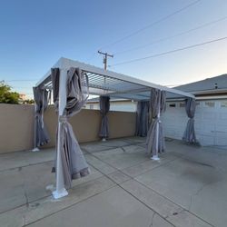 Assemble Crew - We assembled the pergola, anchored it to the concrete, and installed a roller shade