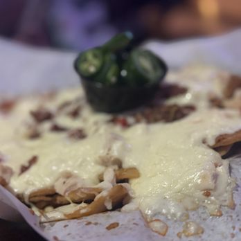Bix - Cheese on chicken nachos - Sports Bars Near Me - West Des Moines, Iowa Bix - Cheese on chicken nachos - Sports Bars Near Me - West Des Moines, Iowa