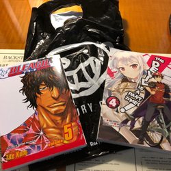 Newbury Comics - They have a great selection of graphic novels and cds especially little gag gifts and sometimes graphic novels are like $1.99