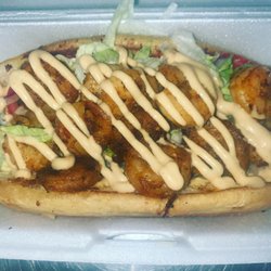 Reel Cajun Cookin - Shrimp Po-Boy drizzled with homemade Beanies Swamp Sauce.