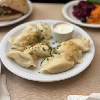 Milkbar Tomasza - Peirogie (boiled - cheese and potato) - Polish Near Me - Kraków, Massachusetts Milkbar Tomasza - Peirogie (boiled - cheese and potato) - Polish Near Me - Kraków, Massachusetts