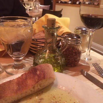 Luigi's Restaurant - Pizza bread, Montepulciano red, & extra virgin olive oil - Italian Near Me - Fairfield, Connecticut Luigi's Restaurant - Pizza bread, Montepulciano red, & extra virgin olive oil - Italian Near Me - Fairfield, Connecticut