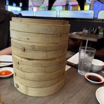 Paradise Dynasty - 4 Steam bao containers: Original pork, pork /cheese, pork with truffle and chicken Xiao long bao - Singaporean Near Me - Costa Mesa, California Paradise Dynasty - 4 Steam bao containers: Original pork, pork /cheese, pork with truffle and chicken Xiao long bao - Singaporean Near Me - Costa Mesa, California