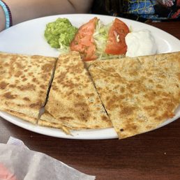 a plate of quesadillas a plate of quesadillas