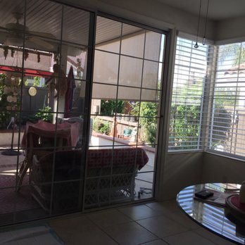 Prime Window Films - Two large patio doors plus corner windows off kitchen and family room. - Home Window Tinting Near Me Prime Window Films - Two large patio doors plus corner windows off kitchen and family room. - Home Window Tinting Near Me