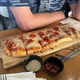Pepperoni flatbread pizza. A meal for one or a good share for two. Pepperoni flatbread pizza. A meal for one or a good share for two.