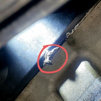 Euro Car Care - instead of replacing gasket, gray silicone added on top of old gasket - Auto Repair Near Me - San Antonio, Texas Euro Car Care - instead of replacing gasket, gray silicone added on top of old gasket - Auto Repair Near Me - San Antonio, Texas