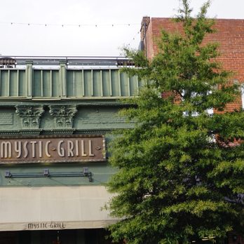 Mystic Grill - Rooftop bar with first come, first serve seating. Awesome views of the clocktower from upstairs. - Southern Near Me - Covington, Georgia