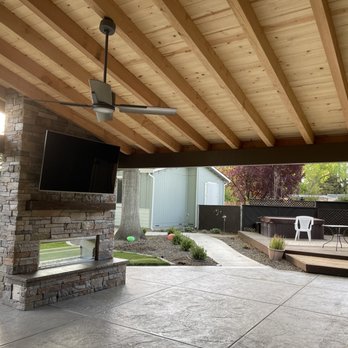 American Dream Siding & Decking - From the inside looking at fireplace. Notice roofing. Very natural! Also, stamped concrete is beautiful! - Siding Near Me - Fair Oaks, California American Dream Siding & Decking - From the inside looking at fireplace. Notice roofing. Very natural! Also, stamped concrete is beautiful! - Siding Near Me - Fair Oaks, California