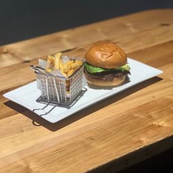 Duelies Sports Bar and Grill - Classic Rock - Seasoned Smash Patty, Fresh Lettuce, House Tomato Relish, and Duelies Fry
Sauce.