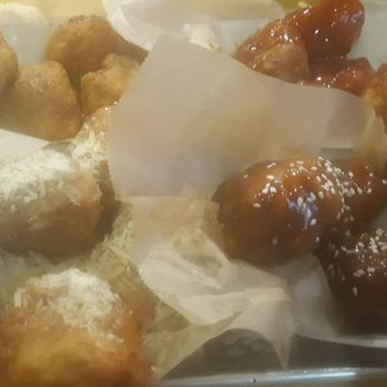 Fire Wings - Balls of Chicken - Lemon Pepper in top left, Sriracha in top right, Garlic Parmesan in bottle left and Teriyaki in bottle right. - Chicken Wings Near Me - Lodi, California Fire Wings - Balls of Chicken - Lemon Pepper in top left, Sriracha in top right, Garlic Parmesan in bottle left and Teriyaki in bottle right. - Chicken Wings Near Me - Lodi, California