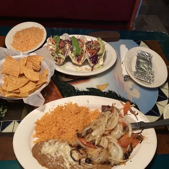 Los Tres - T bone steak smothered in onions and tomatoes w/ fixins - Mexican Near Me - Raleigh, North Carolina