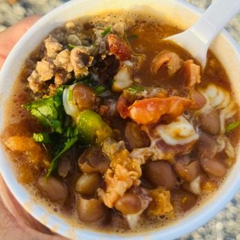 The Grub Lot - a person holding a bowl of soup - Food Trucks Near Me - Erath, Louisiana The Grub Lot - a person holding a bowl of soup - Food Trucks Near Me - Erath, Louisiana